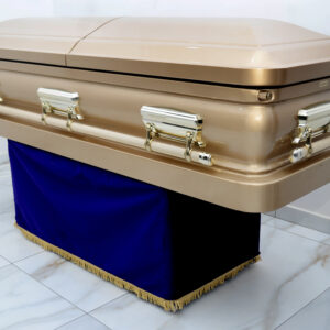 Gold sprayed steel casket with swing handles