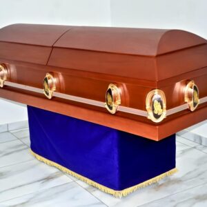 Matt finished doom casket with rose gold stationary handles (praying hands)