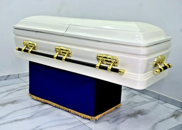 White sprayed boska casket with gold swing accessories