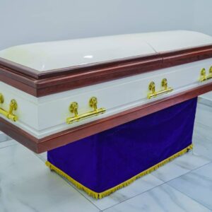 Two toned ebony Italian casket with short gold swing accessories 